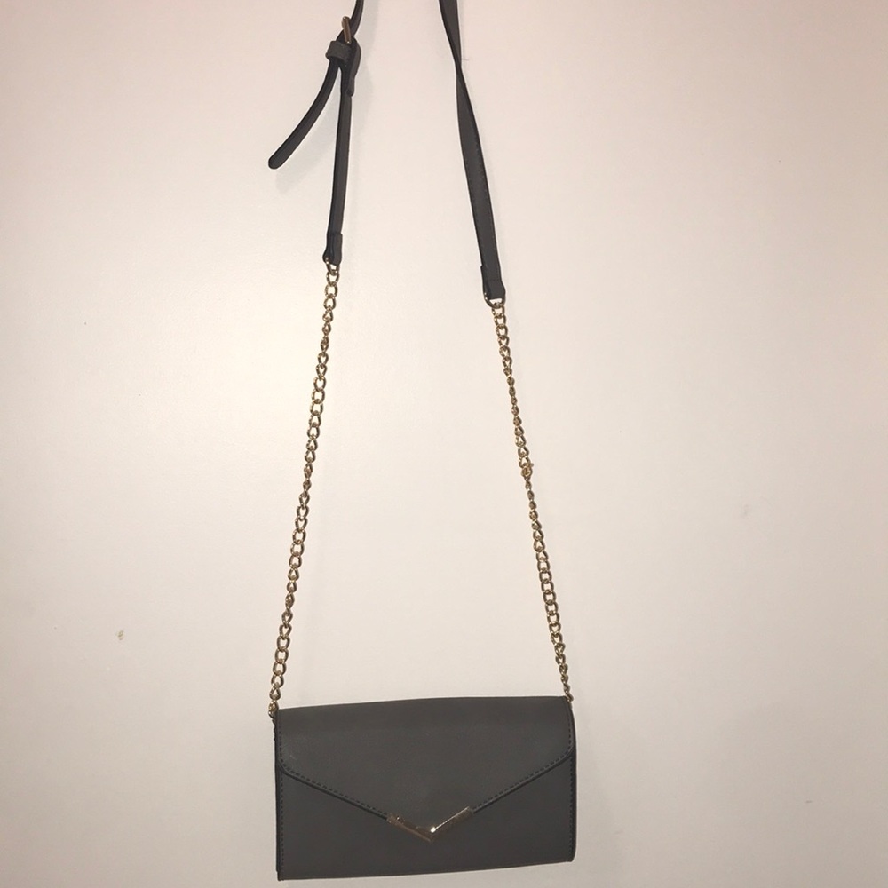 Brand new crossbody with gold accents.